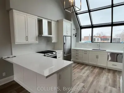 1048 Kingston Road, Toronto, On M4e 1t4