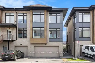 Att/Row/Townhouse in Parkway Park - Queensway Terrace S and Area