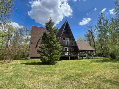 Detached in Dawson