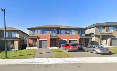 Att/Row/Townhouse in Manor Park - Cardinal Glen and Area